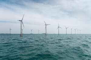 offshore wind farm with beautiful sea water , clean energy background